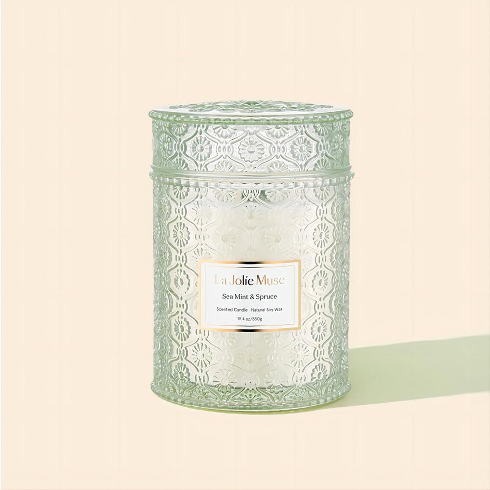 Product Shot of Maelyn - Sea Mint & Spruce 19.4oz candle in the middle