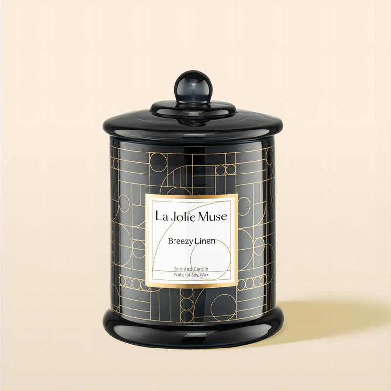 Product Shot of Roesia - Breezy Linen 9.9oz candle in the middle