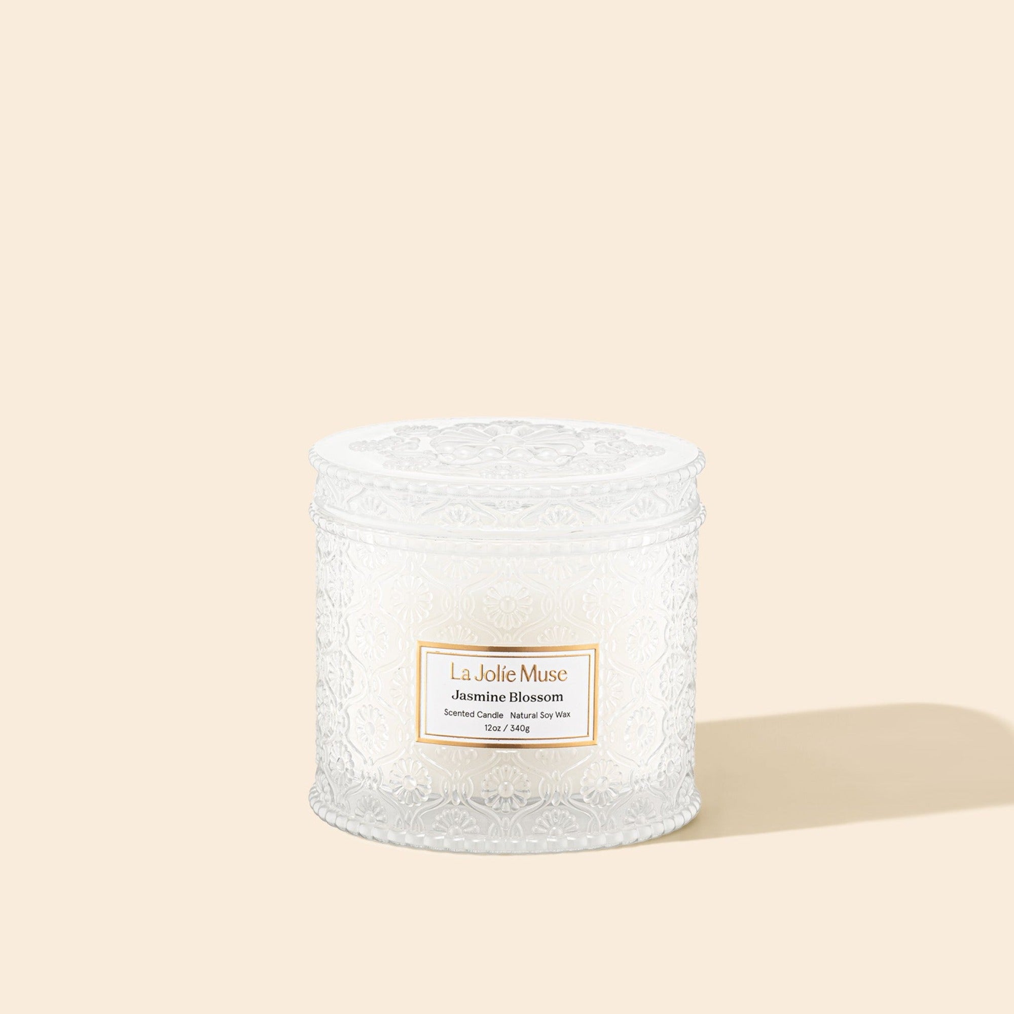 Product Shot of Maelyn - Jasmine Blossom 12oz candle in the middle