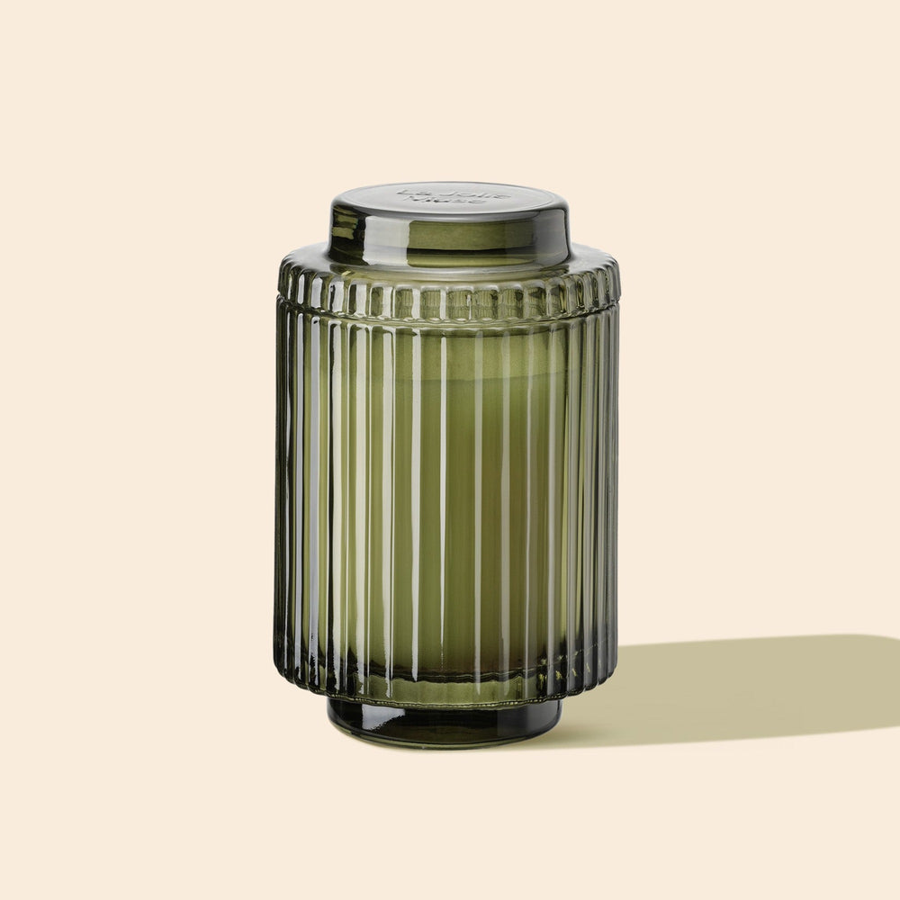 Product Shot of Amélie - Mandarin Matcha 11oz candle in the middle