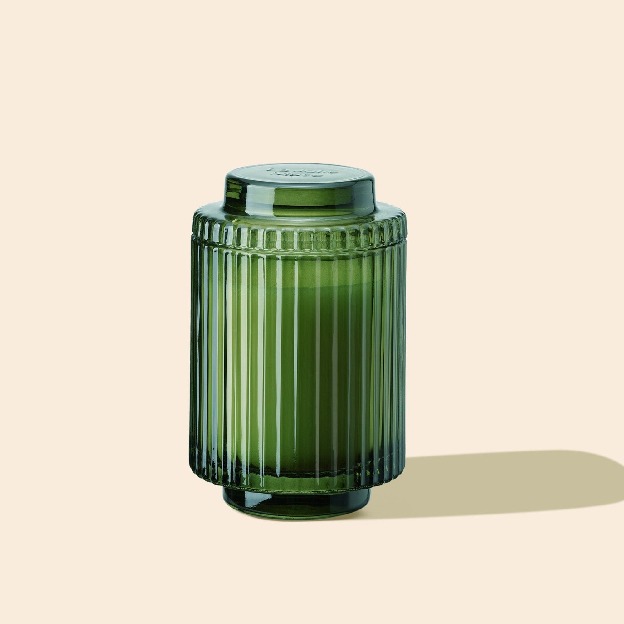 Product Shot of Amélie - Mandarin Matcha 7oz candle in the middle