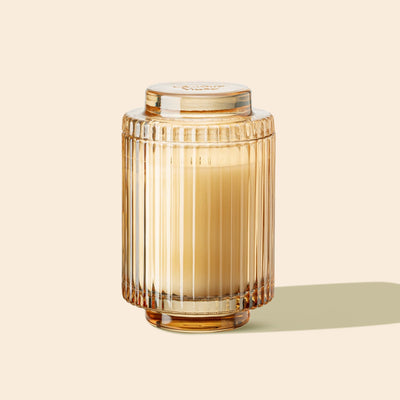 Product Shot of Amélie - Tahitian Lychee 11oz candle in the middle