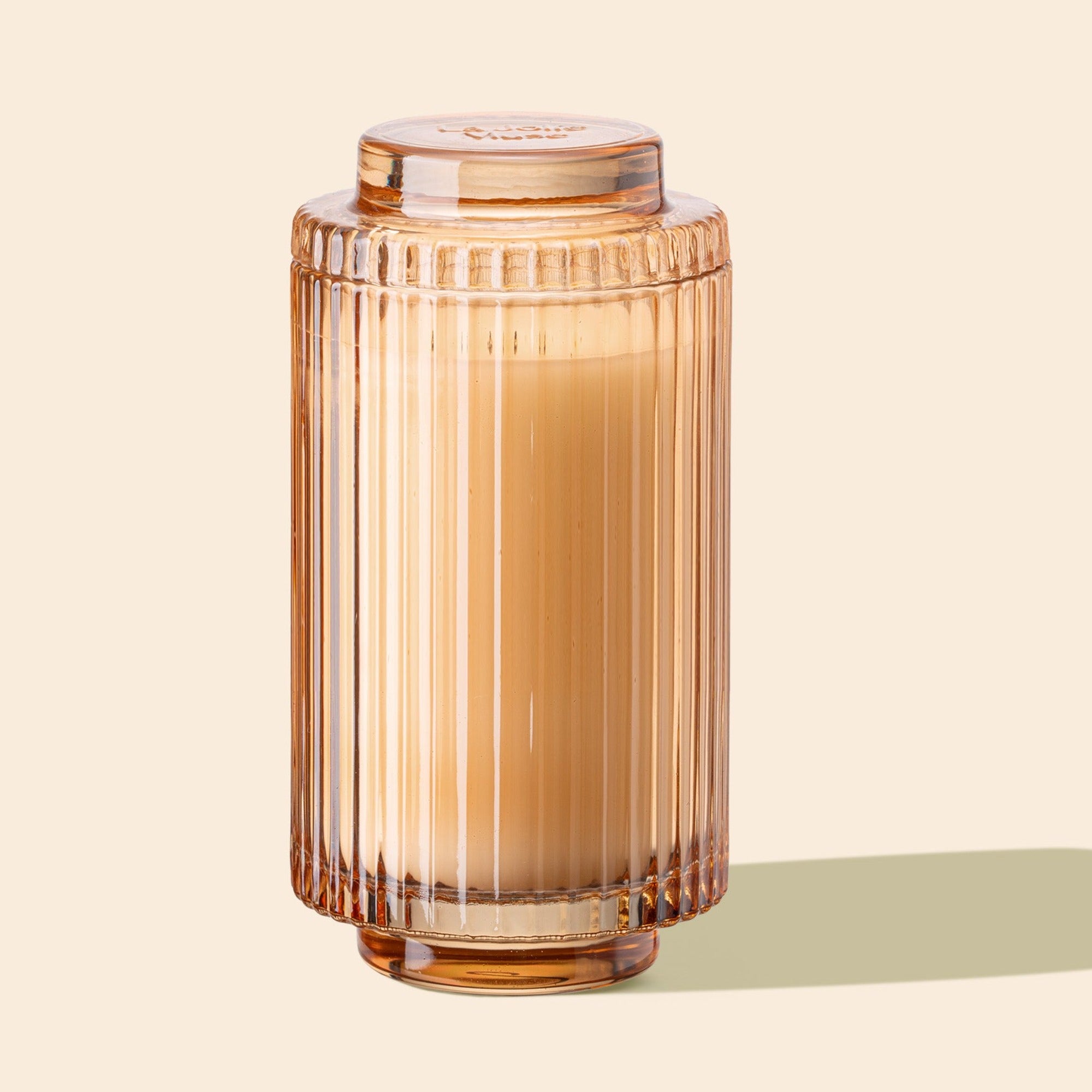 Product Shot of Amélie - Yuzu & Neroli Blossom 19oz candle in the middle