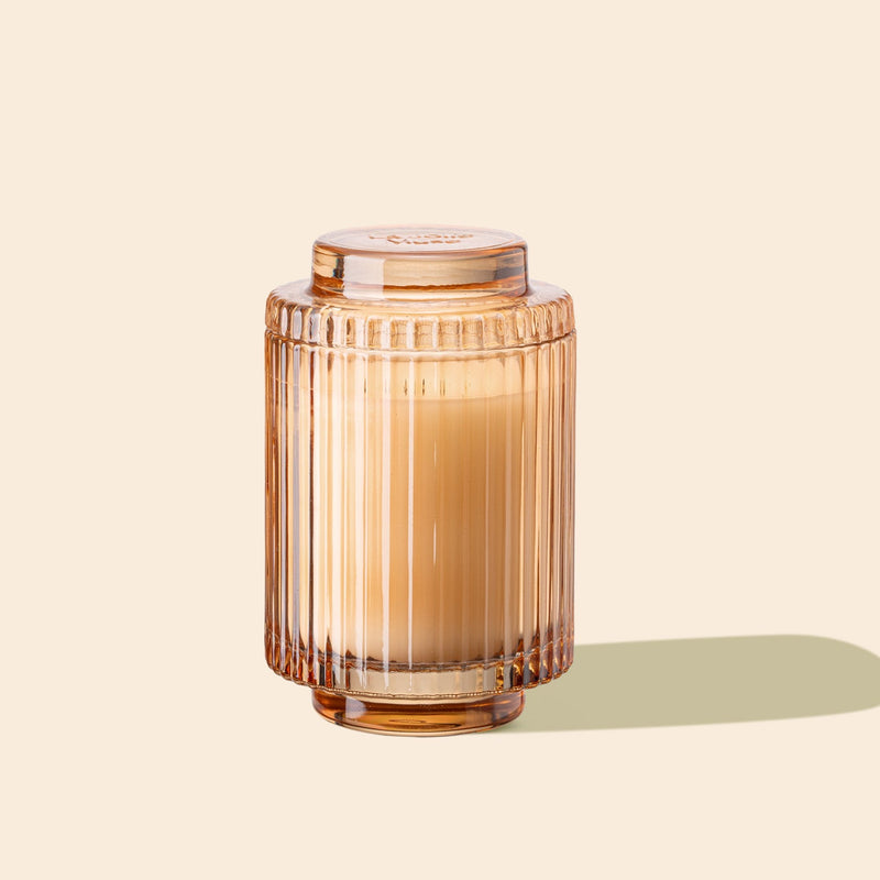 Product Shot of Amélie - Yuzu & Neroli Blossom 7oz candle in the middle