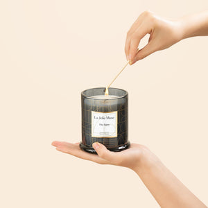 Photo shot of lighting Roesia - Hey Baies 10oz candle with a match candle with a match