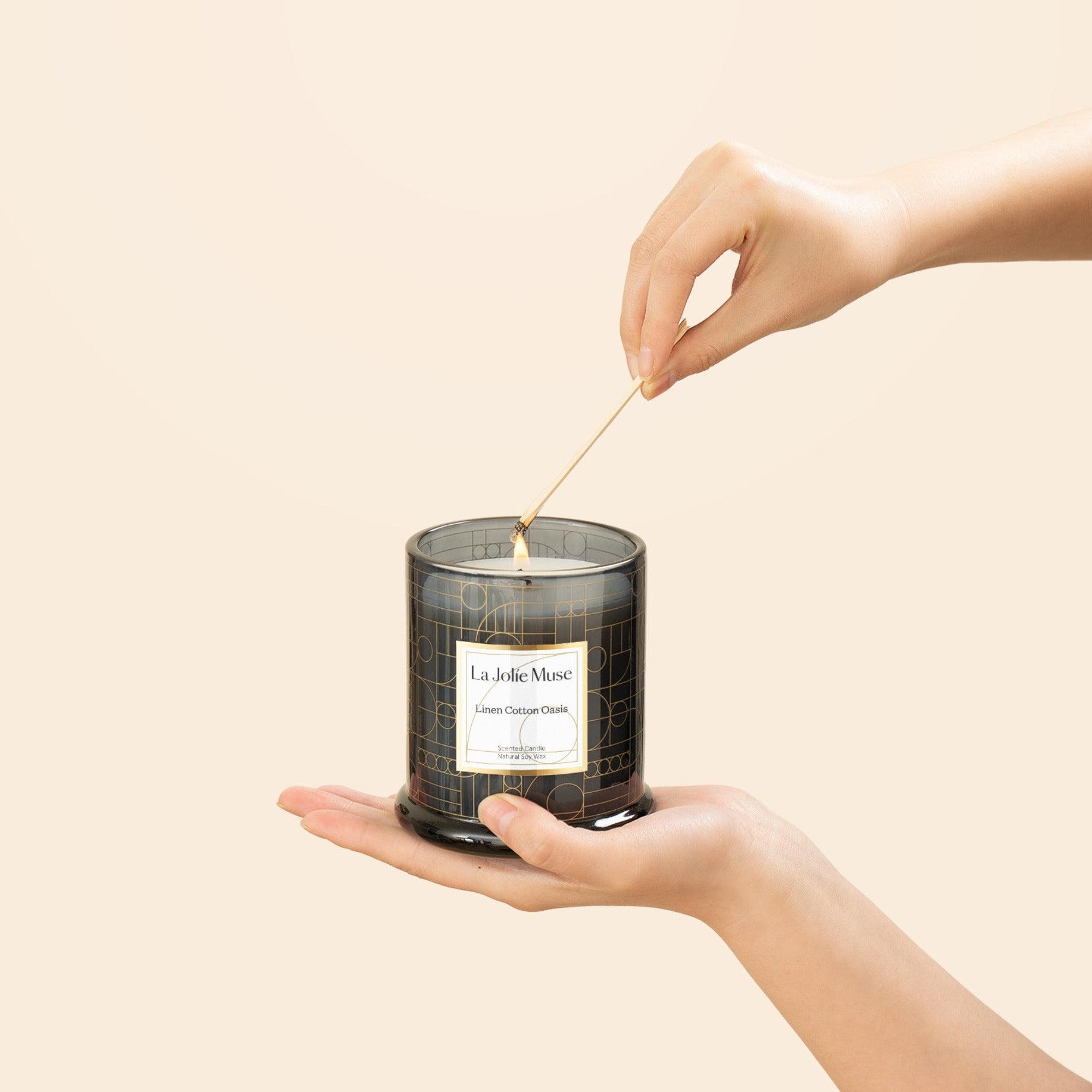 Photo shot of lighting Roesia - Linen Cotton Oasis 10oz candle with a match candle with a match