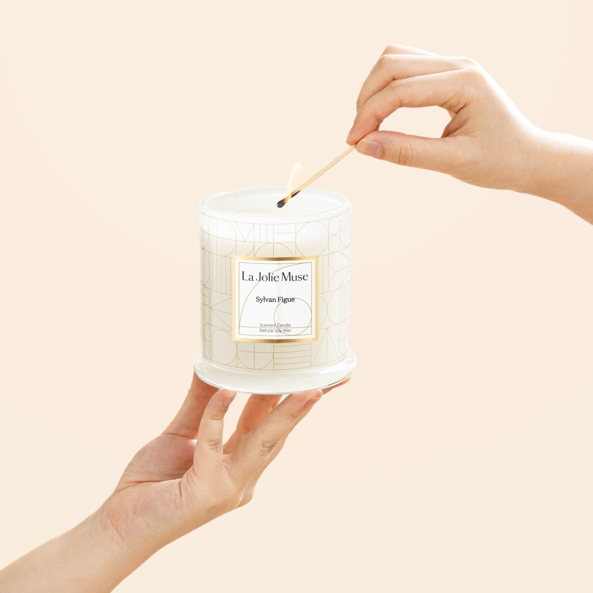 Photo shot of lighting Roesia - Sylvan Figue 10oz candle with a match