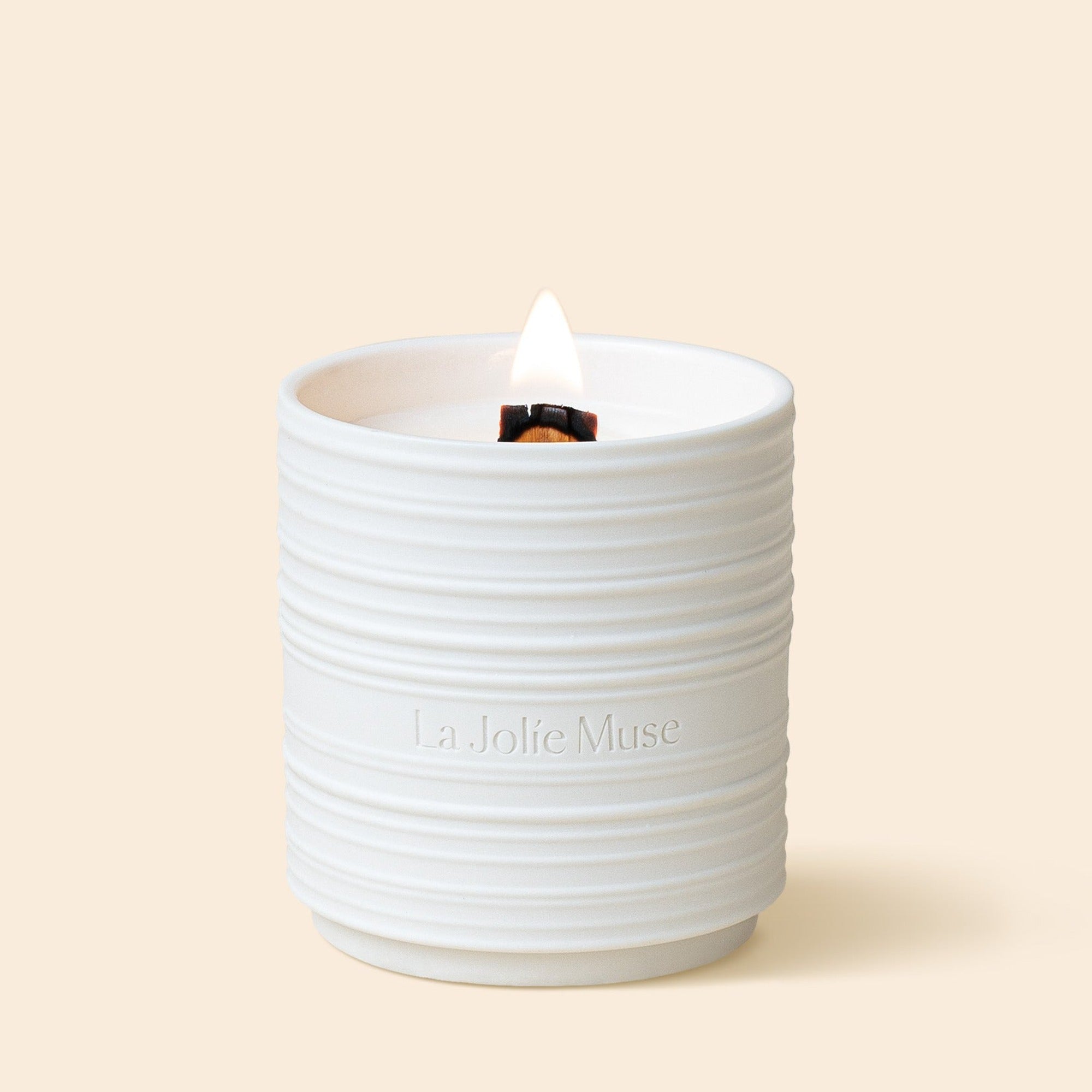 Product Shot of Lucienne - Aegean Sea & Dune 8oz candle in the middle