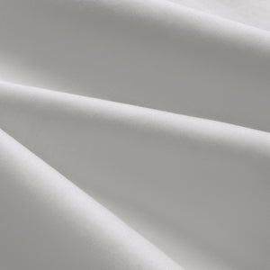 Close up details of Paulina Foggy Triple Satin Stitched Cuff 200 thread count cotton bed sheet set. Gray cotton bed sheet set close up.