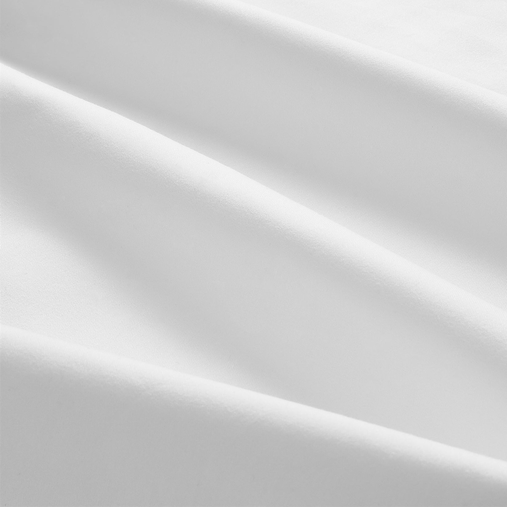 Close up details of Camille Classic White Pleated Cotton Sheet Set. White bedsheet set close up.