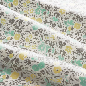 Sofia Yellow and Green Floral 300TC Cotton Sateen Sheet Set set. Close up of yellow and green floral patterned sheet set.