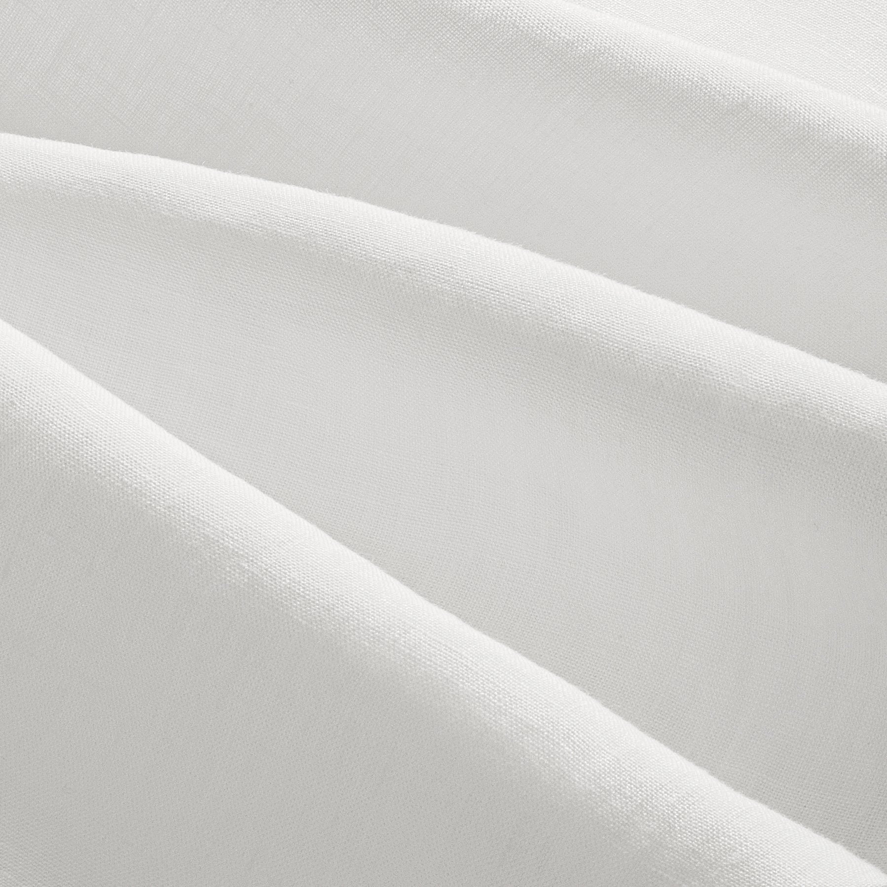 Close up details of Olivia natural soft white linen sheet set. Soft white linen bedsheet set close up.