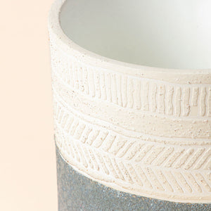 A close-up of the 6.4-inch ceramic planter, showing its patterns design and smooth rim.