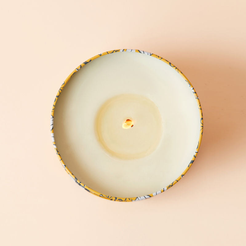 An overhead view of Orange and Bergamot Scented candle, showing its natural wax. 