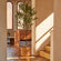 The tallest 5.9 feet artificial olive tree is placed near a stairway, with its style matching the room setting.