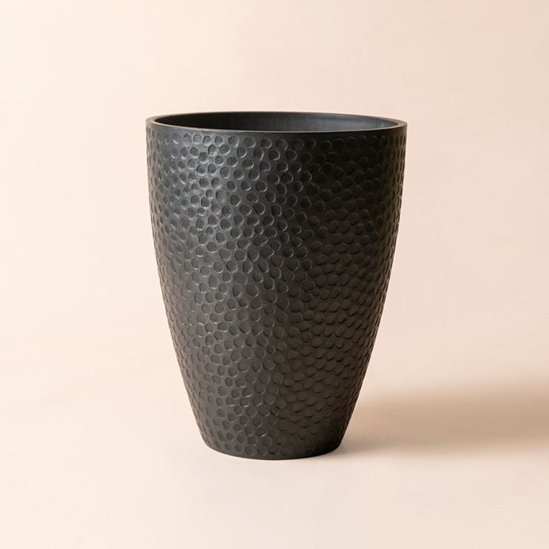 A full view of 14.2-inch black planter with honeycomb pattern, made from plastic and stone powders.