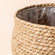 A close up of seagrass planter, showing its woven texture and large dimension in 13.5 inches.