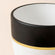 A close-up of the large pot in the set. Showing its classic black and white palette with gold line detail.