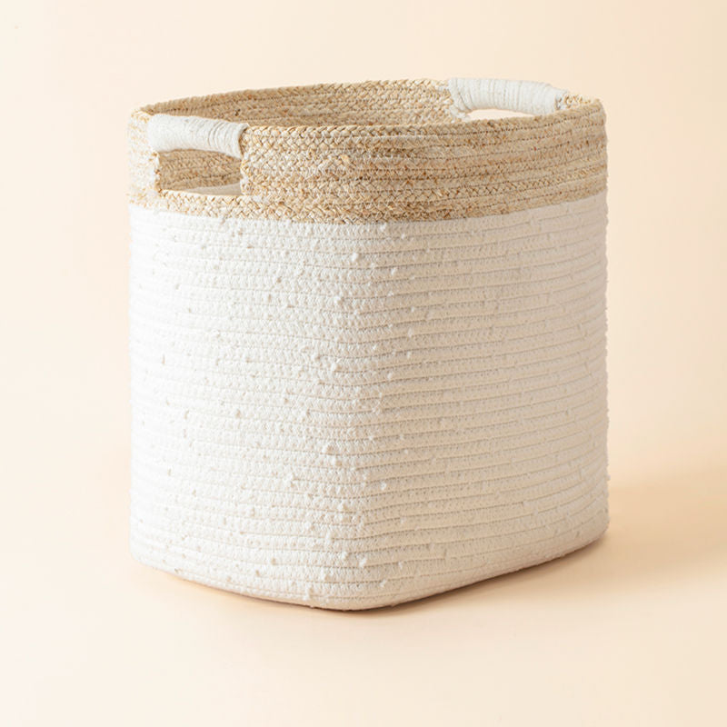 The rounded rectangle basket is made of cotton rope and corn skin. A perfect house organizing solution with two built-in handles.
