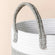 A close-up of the cotton rope laundry basket, showing its gray cotton handle and portable feature.