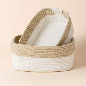 A front view of the set of cotton rope and jute storage basket. The smaller storage is placed inside the big one and shows its natural cotton feature.