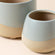 A close look of Duna's empty gray & beige pots in both the bigger and smaller size.
