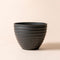 A full view of Greece black planter, made from recyclable plastic and natural stone powders.