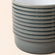 A close-up of the 4.7-inch pot, showing its horizontal tidy lines design and glazed finish features.