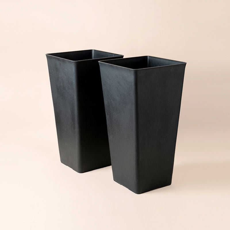 The full view of the Lenn black pots set, with two 26-inch tall planters included.