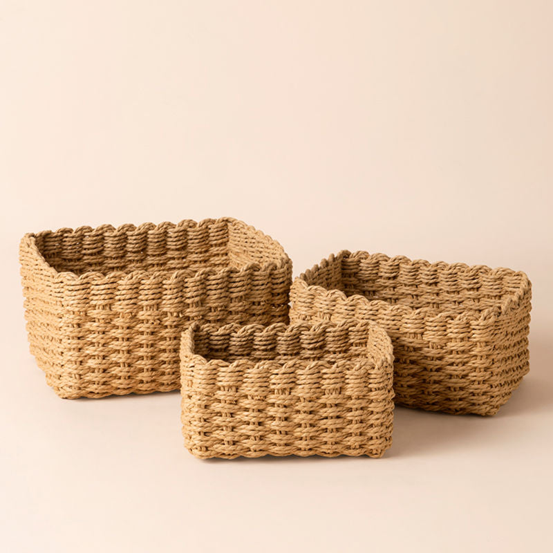 A whole scene of storage basket set, made of paper rope. A set contains three sizes to fit multi-purpose house organizing.