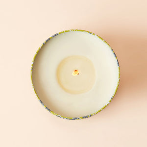 An overhead view of Peach and Kiwi Scented candle, showing its natural wax.