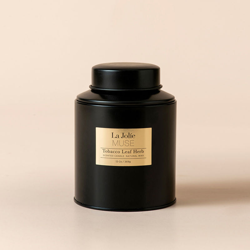 Tobacco Leaf Herb candle with Pisa Scented is packaged in a black tin, 13oz/369g in weight.