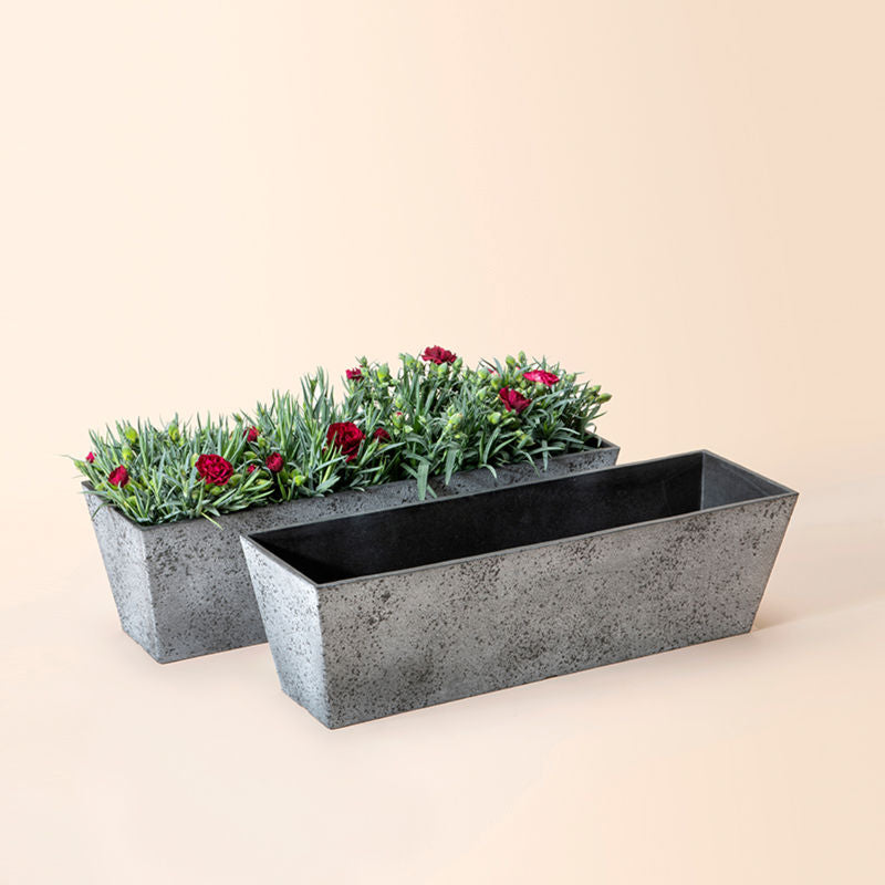 The rock grey planter set simply falls into a trapezoid shape. Are made of ceramic for indoor and outdoor use.