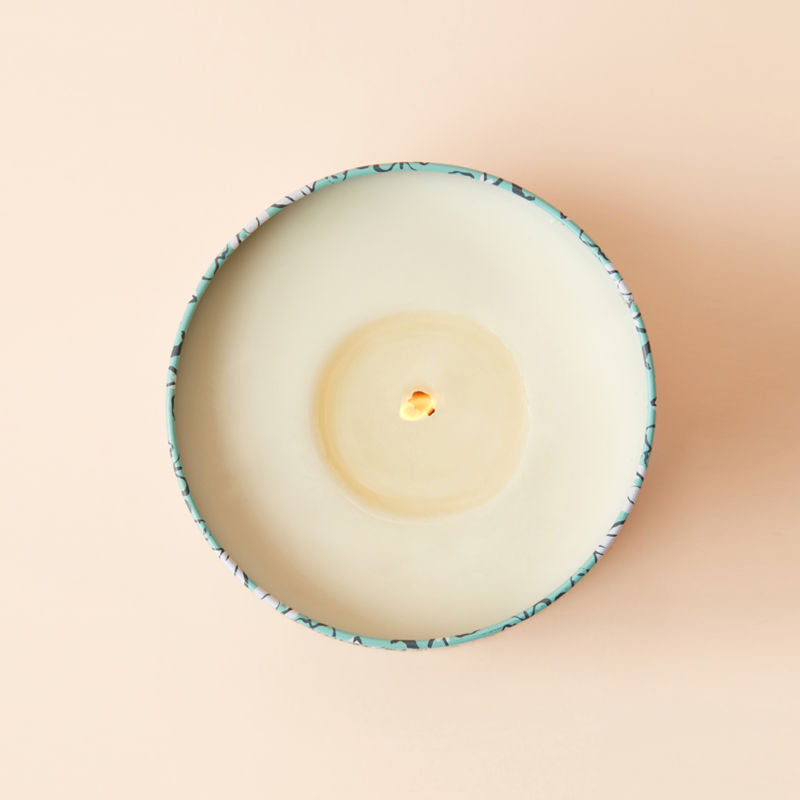 An overhead view of Fig and Coconut candle, showing its natural wax.