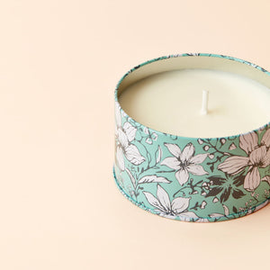 A close up of Fig and Coconut candle, showing its cotton wick.