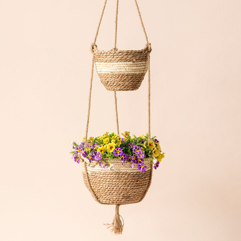 A set of two pots are hanging together in a vertical way with support from ropes. Each set contains 9.8-inch and 8.3-inch planters.