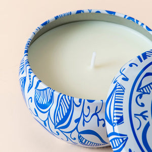 A close up of single Tulip Scented Citronella candle, showing its cotton wick.