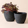 Planters are overlaid by dark texture and obsidian granite patterns. Each set contains 8.6-inch and 7.5-inch planters.