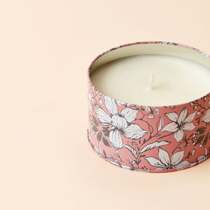 A close up of Sunkissed Rose candle, showing its cotton wick.