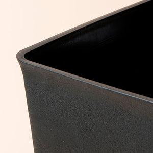 A close up of black planter, showing its square shape and large dimension in 20 inches.