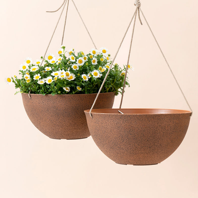 A set of two terracotta hanging pots, made from recyclable plastic and natural stone powders.