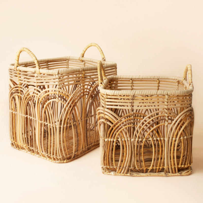 Two rattan baskets, handwoven with PE tubes and supported by an iron frame.